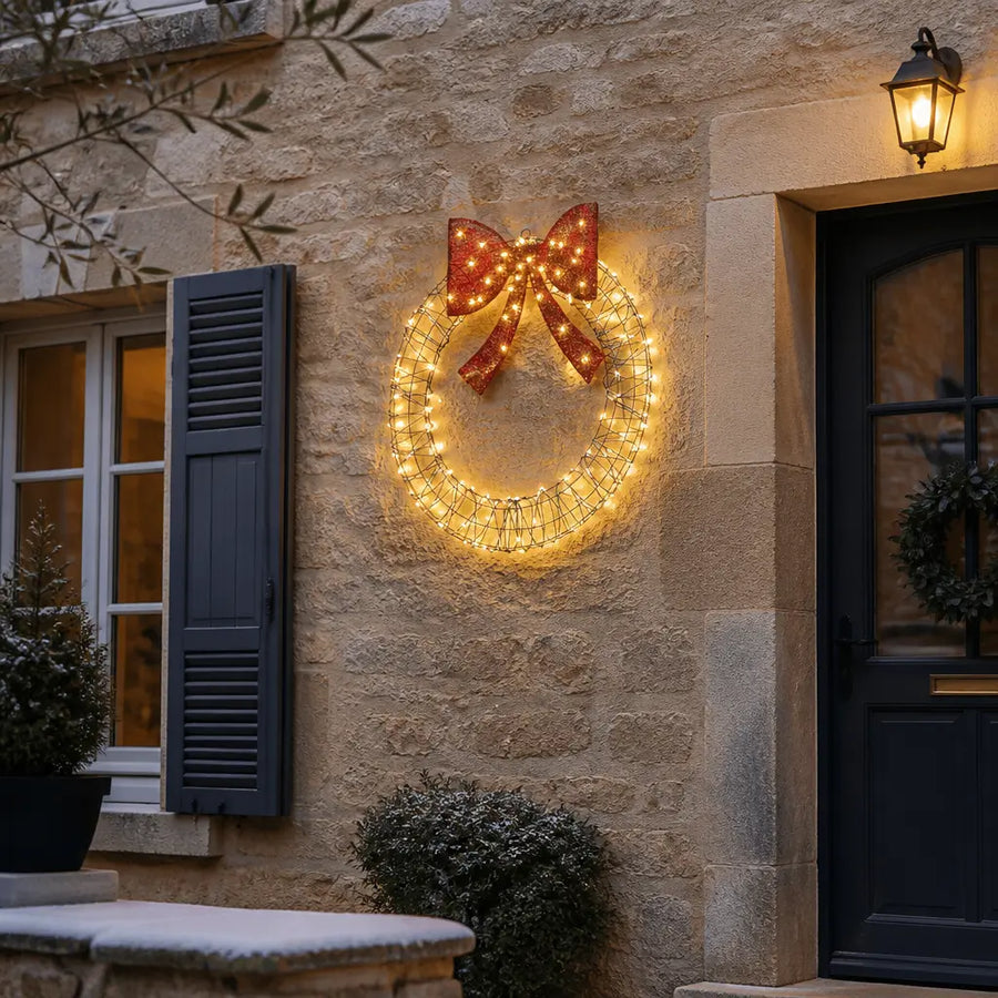 Couronne de Noël lumineuse en rotin avec nœud rouge