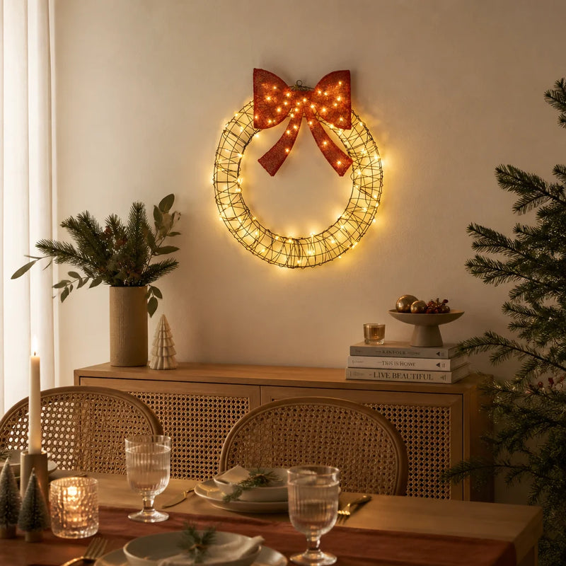 Couronne de Noël lumineuse en rotin avec nœud rouge